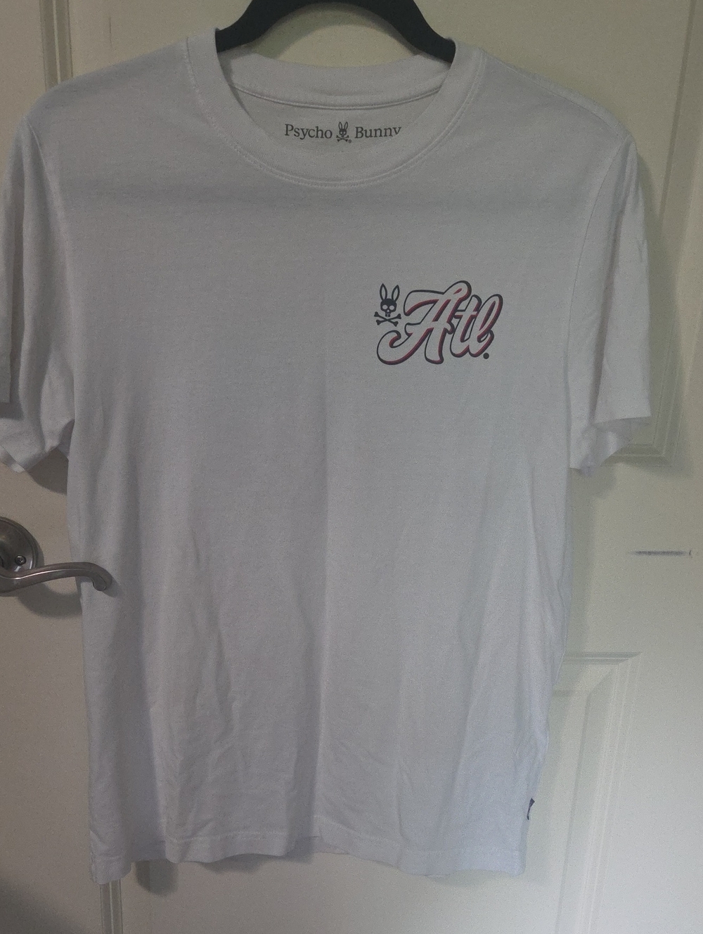 Psycho Bunny White Tee with Red-Outlined ATL Script